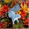 Hand painted gray squirrel autumn decoration.